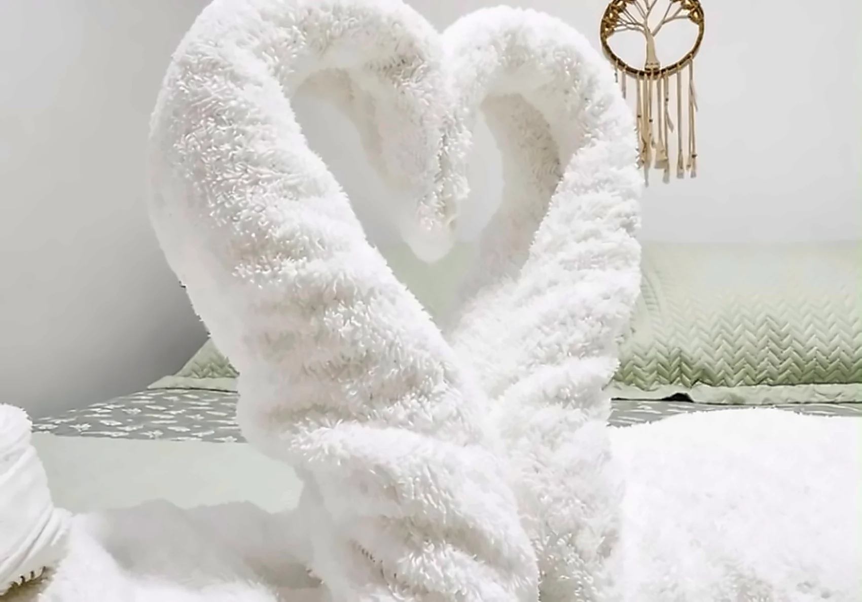 Toalhas decorativas sobre a cama do Quarto Standard